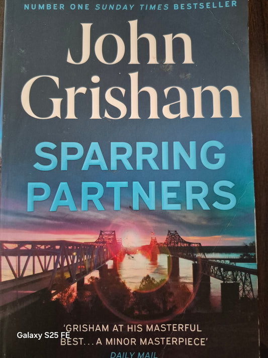 Sparring Partners – John Grisham